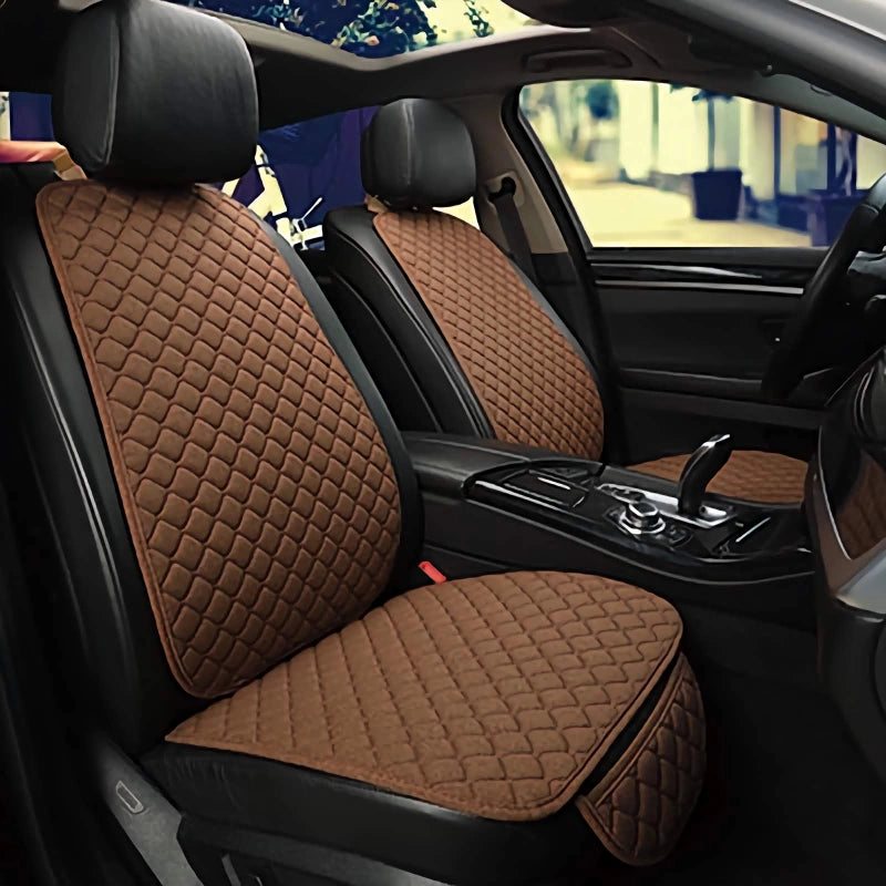 Brown quilted car seat covers on a car interior