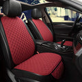 Red quilted car seat covers on a vehicle interior