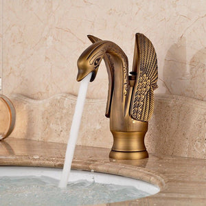 gold-brass-swan-basin-taps.jpg